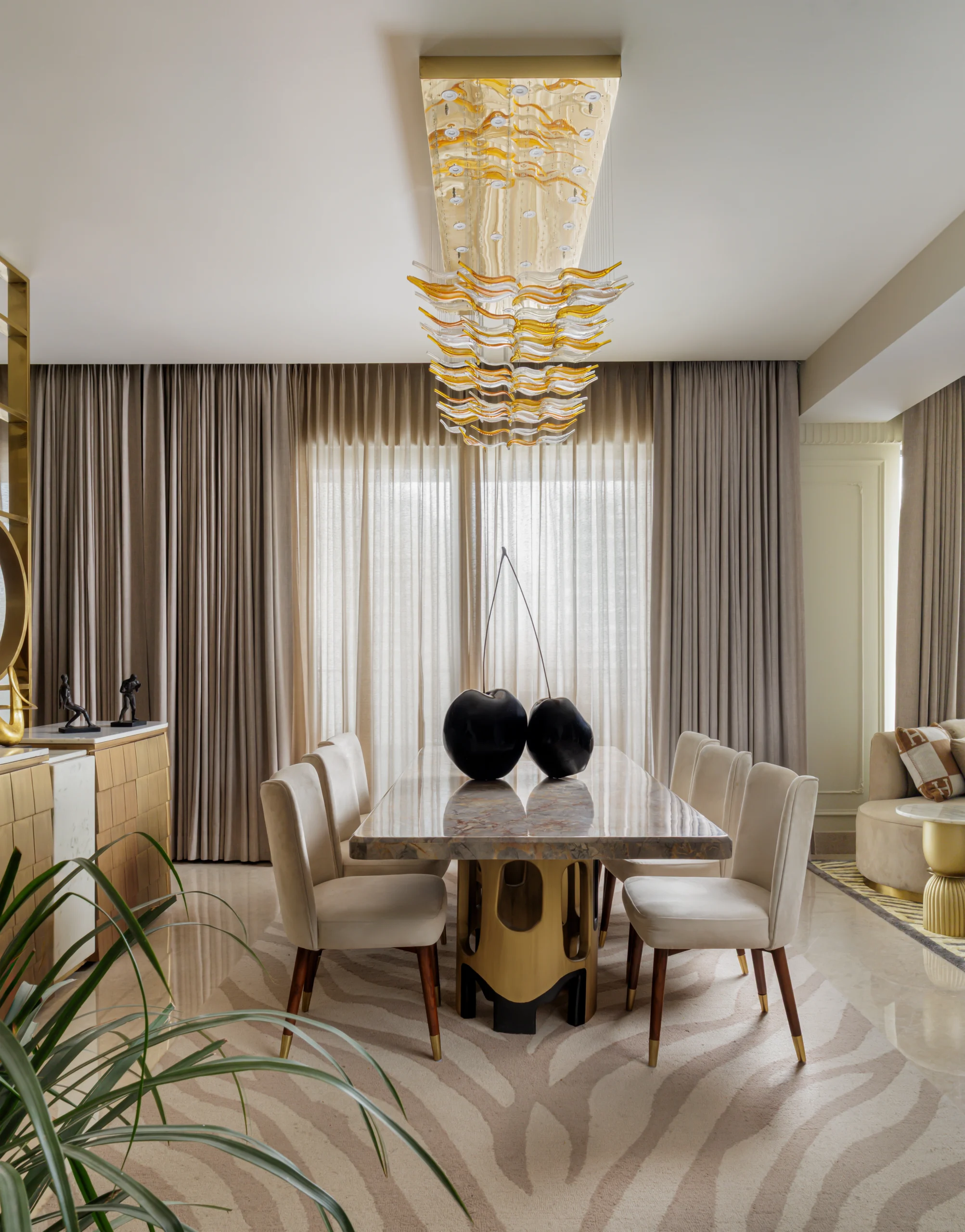 Minimal lounge with sculptural seating and soft daylight
